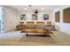 Home theater featuring plush seating, projector, and custom wall art for an immersive entertainment experience at 2630 Milford Berry Ln, Tampa, FL 33618