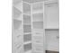 Organized closet with white shelving and drawers, maximizing storage space at 3465 Bumelia Ln, New Port Richey, FL 34655