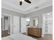 Spacious main bedroom with a walk-in closet and an en-suite bathroom at 3465 Bumelia Ln, New Port Richey, FL 34655