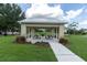 Picturesque picnic pavilion with charcoal grills, perfect for outdoor gatherings and enjoying the beautiful surroundings at 3465 Bumelia Ln, New Port Richey, FL 34655
