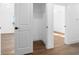 This closet features a wire rack shelf and luxury vinyl plank flooring at 3592 Arrowhead Ave, Spring Hill, FL 34606