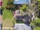 Birds eye view of home with solar panels on roof and nice yard at 4725 3Rd S Ave, St Petersburg, FL 33711