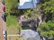 Birds eye view of home with solar panels on roof and nice yard at 4725 3Rd S Ave, St Petersburg, FL 33711