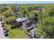 An aerial view of a well-maintained home surrounded by lush greenery, emphasizing its curb appeal at 4725 3Rd S Ave, St Petersburg, FL 33711