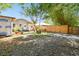 A large backyard with mature trees, a wooden fence, and a small shed, providing ample outdoor space at 4725 3Rd S Ave, St Petersburg, FL 33711