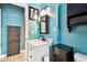 Stylish bathroom features a new vanity, framed mirror, and medicine cabinet at 4725 3Rd S Ave, St Petersburg, FL 33711