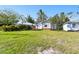 A charming home featuring a well-kept lawn and a quaint porch at 4725 3Rd S Ave, St Petersburg, FL 33711