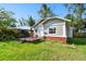 A charming single-Gathering home featuring a well-kept lawn and a quaint front porch at 4725 3Rd S Ave, St Petersburg, FL 33711