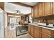 Connected living spaces flow together, including the kitchen, dining, and living room with hardwood flooring at 4725 3Rd S Ave, St Petersburg, FL 33711
