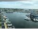 Picturesque view of boats docked at the marina visible from condo at 4939 Floramar Ter # 810, New Port Richey, FL 34652