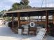 A relaxing cabana with plenty of seating and views of the water at 4939 Floramar Ter # 810, New Port Richey, FL 34652