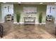 Comfortable lounge area featuring neutral tones, tile flooring, and stylish decor at 4939 Floramar Ter # 810, New Port Richey, FL 34652