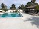 A refreshing community pool with plenty of space to relax in the sun at 4939 Floramar Ter # 810, New Port Richey, FL 34652