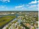 Aerial view of the waterfront neighborhood with scenic canals and neighborhood close to the ocean at 5500 Leahy Ln, New Port Richey, FL 34652