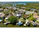 Aerial view of the backyard, boat dock and deck overlooking the water at 5500 Leahy Ln, New Port Richey, FL 34652