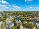 An aerial shot shows waterfront homes along canals, creating a peaceful residential community with boating opportunities at 5500 Leahy Ln, New Port Richey, FL 34652