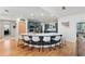 Spacious kitchen with a large bar, white countertops and modern appliances at 5500 Leahy Ln, New Port Richey, FL 34652