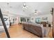 Spacious living room in an open concept, seamlessly blending comfort and style at 5500 Leahy Ln, New Port Richey, FL 34652