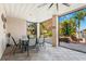 Outdoor patio featuring tile flooring, a ceiling fan, and view of the pool at 5500 Leahy Ln, New Port Richey, FL 34652