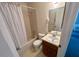 Clean bathroom offers a shower-tub combination with neutral tile and a standard single sink vanity at 6012 Landover Blvd, Spring Hill, FL 34609
