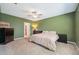 Bright bedroom with neutral colors and large windows at 6068 Apple Snail Ave, New Port Richey, FL 34653