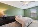 Cozy bedroom features neutral carpet and an abundance of space at 6068 Apple Snail Ave, New Port Richey, FL 34653