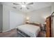 Relaxing bedroom with soft lighting, closet and neutral toned carpet at 6068 Apple Snail Ave, New Port Richey, FL 34653