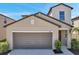 Charming home featuring a two-car garage and landscaped front yard at 6068 Apple Snail Ave, New Port Richey, FL 34653