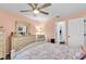 Bedroom with natural light, complete with dresser and comfortable armchair at 6420 Cabbage Ln, New Port Richey, FL 34653