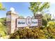 Briar Patch community sign with lush landscaping in a 55+ deed-restricted neighborhood at 6420 Cabbage Ln, New Port Richey, FL 34653