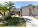Attractive home with a well-maintained lawn and curb appeal at 6420 Cabbage Ln, New Port Richey, FL 34653