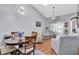 Inviting living room with vaulted ceilings, fan, and lots of natural light at 6420 Cabbage Ln, New Port Richey, FL 34653