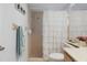 Bathroom featuring a shower, vanity with sink, and ample lighting at 6530 Pine Meadows Dr, Spring Hill, FL 34606
