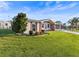 Charming single-story home boasts a well-manicured lawn and inviting front porch perfect for relaxing at 6536 Beach Blvd, Hudson, FL 34667