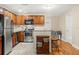 Well-equipped kitchen features a breakfast bar, stainless appliances, and ample cabinet space at 7240 Creek Dr, New Port Richey, FL 34655