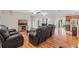 Spacious living area with hardwood floors, recessed lighting, and an open floor plan at 7240 Creek Dr, New Port Richey, FL 34655