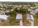 Spacious property featuring a well-maintained home, lush greenery, and defined property lines in a serene neighborhood setting at 7506 Moriah Ave, Brooksville, FL 34613