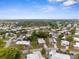 Expansive residential area featuring charming homes with well-manicured lawns and lush trees, creating a serene and welcoming environment at 7506 Moriah Ave, Brooksville, FL 34613