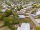 An aerial shot of neighborhood homes showcasing the area's serene surroundings at 7506 Moriah Ave, Brooksville, FL 34613