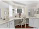 Bright bathroom featuring dual sinks, ample counter space, and a well-lit vanity area for convenient and stylish grooming at 7506 Moriah Ave, Brooksville, FL 34613