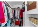 Walk-in closet with clothing racks, shelves, and ample storage space at 7506 Moriah Ave, Brooksville, FL 34613