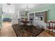 Dining area with a table, chairs, and view of the outdoors at 7506 Moriah Ave, Brooksville, FL 34613
