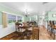 Lovely dining room with a view to the outside and breakfast bar at 7506 Moriah Ave, Brooksville, FL 34613