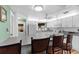 Open kitchen with breakfast bar and ample cabinet space at 7506 Moriah Ave, Brooksville, FL 34613