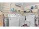 Laundry room with new washer, dryer, and plenty of storage at 7506 Moriah Ave, Brooksville, FL 34613
