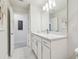 Bathroom with white cabinets and granite countertop at 778 Parsons Mooring Ct, Seffner, FL 33584