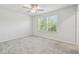 Bright bedroom with windows and neutral carpet at 778 Parsons Mooring Ct, Seffner, FL 33584