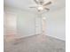 Bedroom with carpet and access to walk-in closet at 778 Parsons Mooring Ct, Seffner, FL 33584