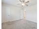 Bright bedroom with a ceiling fan and neutral carpeting at 778 Parsons Mooring Ct, Seffner, FL 33584