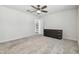 Bedroom with neutral carpet and access to walk in closet at 778 Parsons Mooring Ct, Seffner, FL 33584